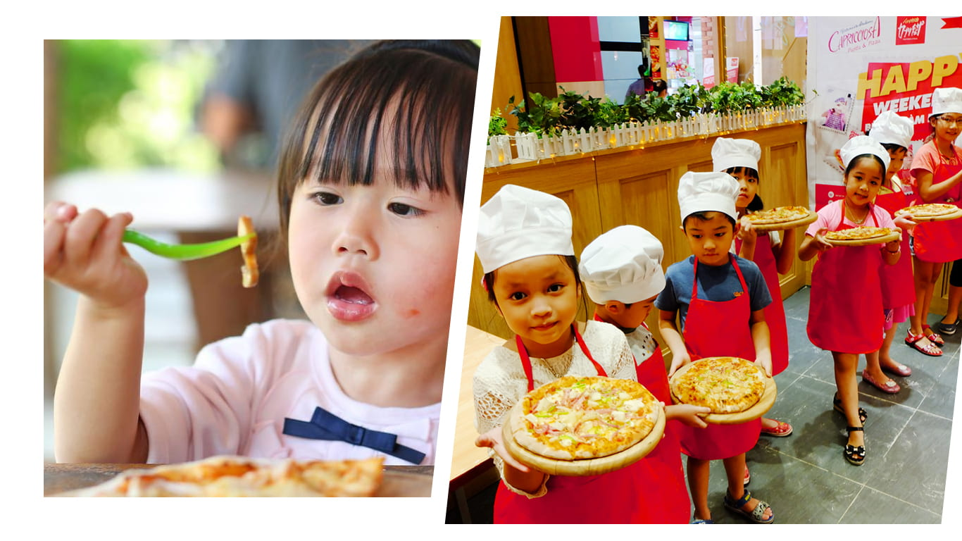Các bé mẫu giáo VAIC vui vẻ làm pizza trong workshop hè 2025.